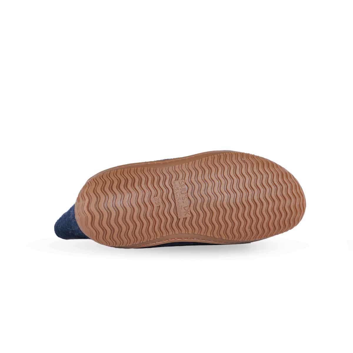 Håndlavede blå uld støvle fra Shus.dk, lavet af 100% New Zealandsk uld, sikrer varme og komfort. Med høj skaft og natur gummisål. Dansk design.