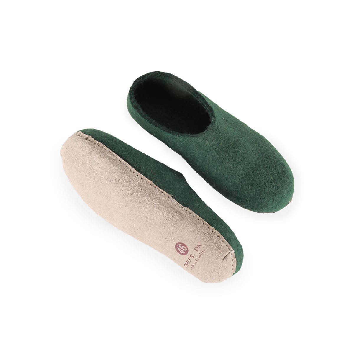 Håndlavede grønne uldhjemmesko fra Shus.dk, lavet af 100% New Zealandsk uld, sikrer varme og komfort. Med skindsål. Dansk design.