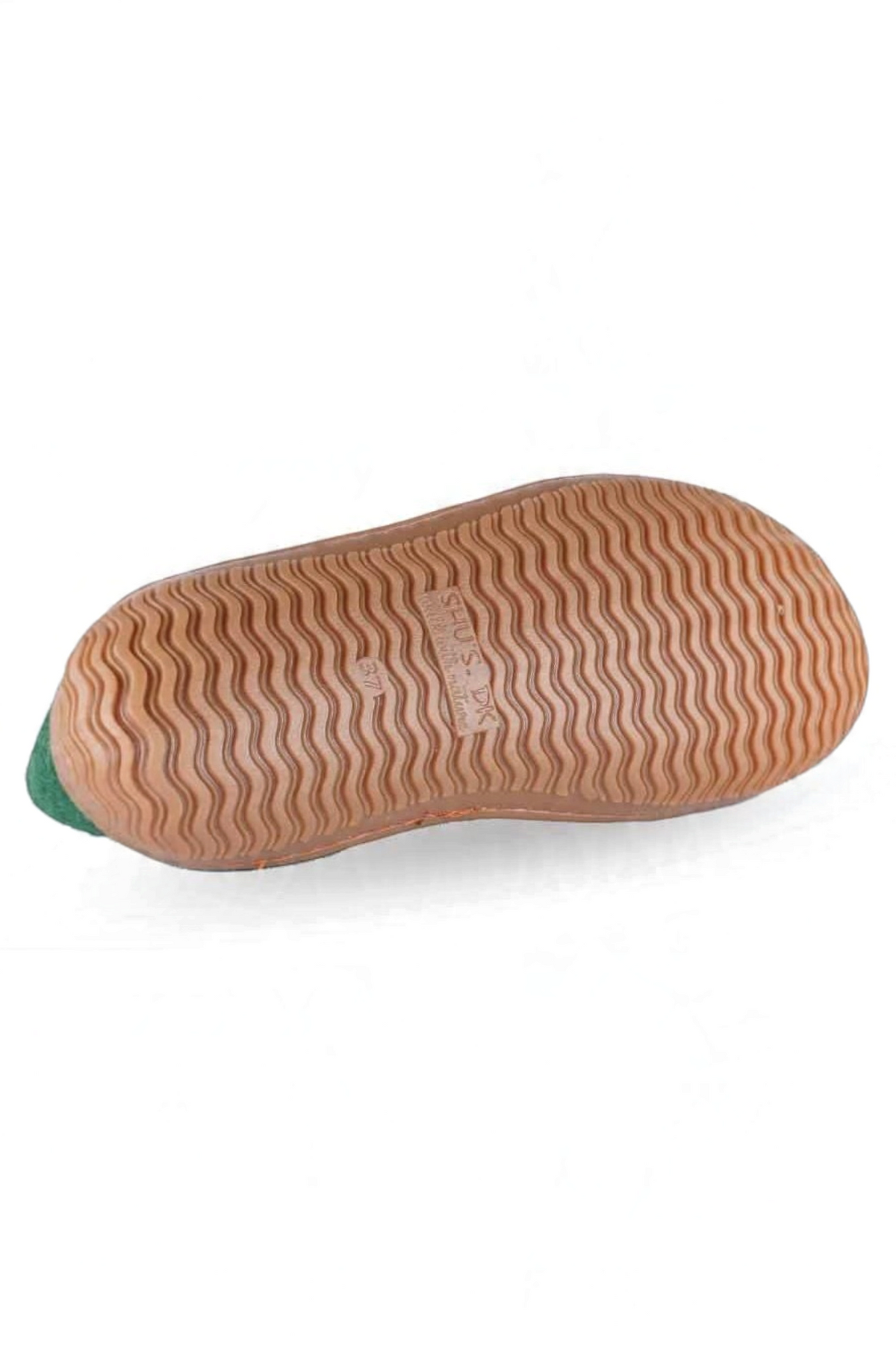 Håndlavede grønne uld hjemmesko fra Shus.dk, lavet af 100% New Zealandsk uld, sikrer varme og komfort. Med natur gummisål. Dansk design.